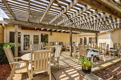 Outdoor seating area with shaded pergola