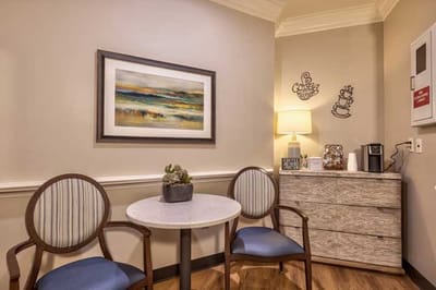 Cozy corner with chairs and artwork