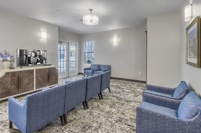 Common area with seating and television