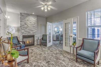 Cozy common area with elegant seating and fireplace