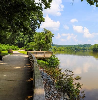 Scenic walking path along a tranquil river