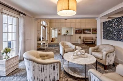 Cozy common area with seating and decor.