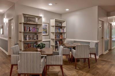 Common area with bookshelves and seating