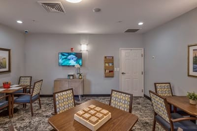 Common area with seating and a television.
