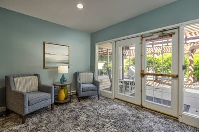 Welcoming lobby area with seating and natural light