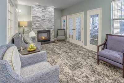 Cozy common area with seating and fireplace