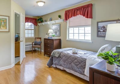 Cozy private room with a bed and decor