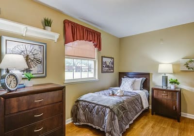 Cozy resident room with a bed and decorations