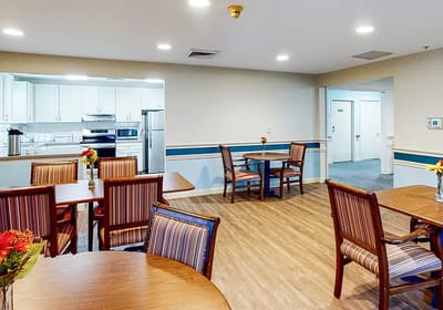 Interior view of a common area with dining tables