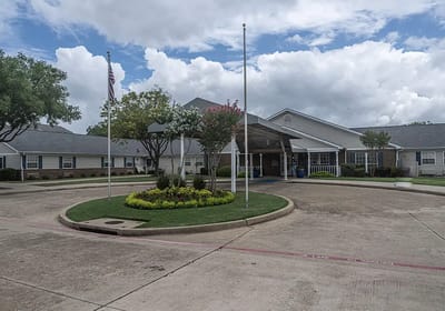 Exterior view of Arden Courts of Richardson with landscaping