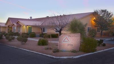 Exterior view of assisted living facility with landscaping