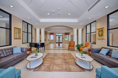 Lobby area with seating and piano