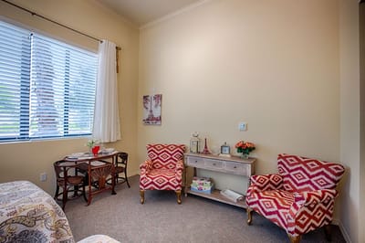 Cozy sitting area in a resident's room.