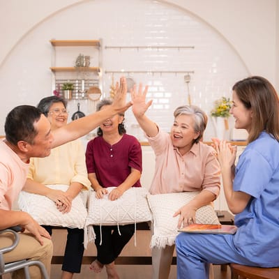Residents and staff enjoying a fun group activity