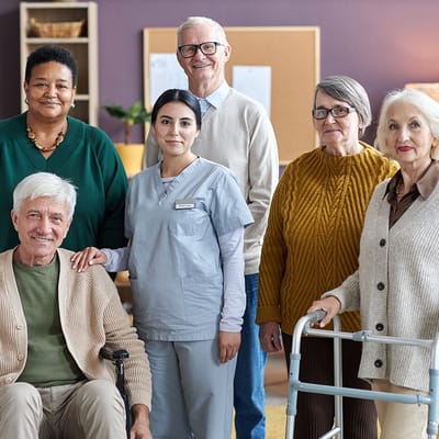 Group of residents and staff in common area