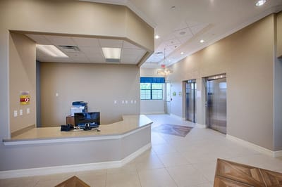 Welcoming interior reception area with elevators