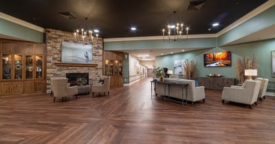 Welcoming lobby area with comfortable seating and artwork.