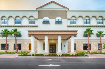 The exterior entrance of Exquisite Living Residence.