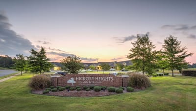 Hickory Heights Health & Rehab exterior at sunset