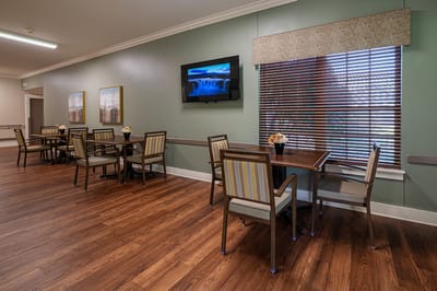 Interior common area with tables and chairs