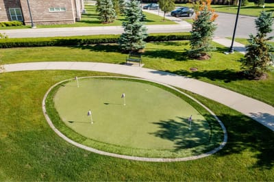 Aerial view of putting green in a landscaped area