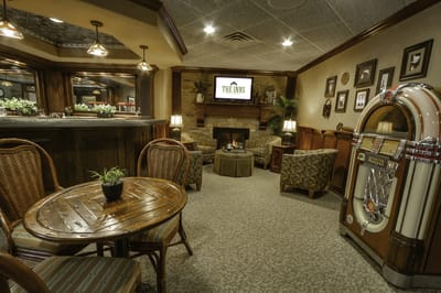 Cozy lounge area with comfortable seating and a jukebox.