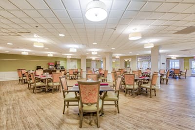 Bright dining room with tables and chairs
