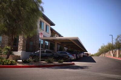 Exterior view of the facility with parking area