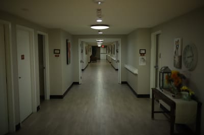 Interior view of a facility hallway with doors