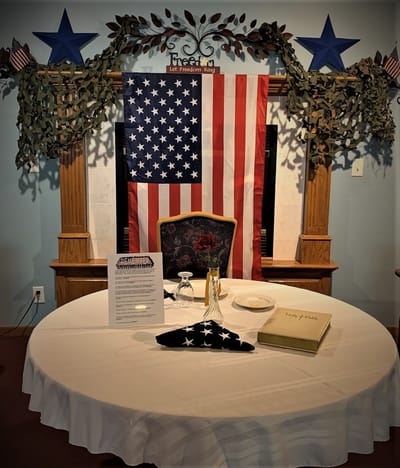 Decorative display with American flag and table setting