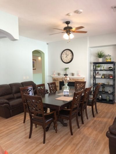 A cozy common area with a large dining table
