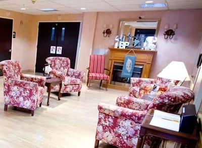 Cozy interior common area with floral furniture