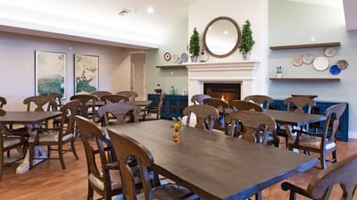 Bright dining room with wooden tables and chairs
