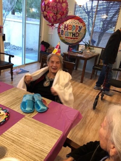 Residents celebrating a birthday with decorations