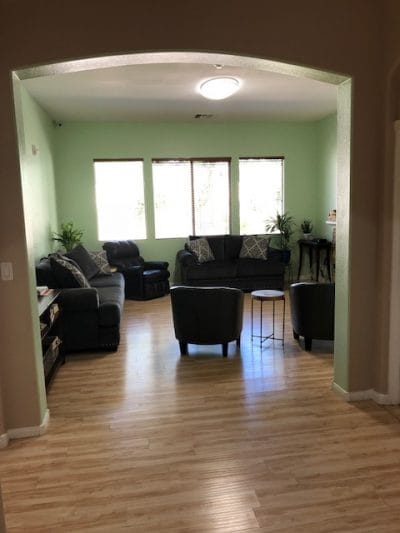 Cozy common area with seating and natural light