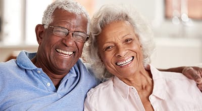 Happy elderly couple smiling together