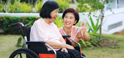Residents enjoying time outside in a garden