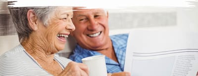 Seniors happily enjoying a moment together indoors