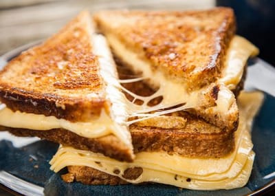 A close-up of a grilled cheese sandwich