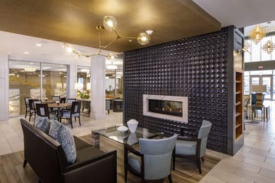 Interior lounge area with seating and fireplace