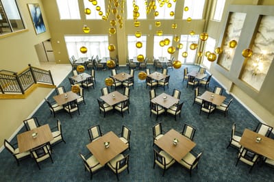 Elegant dining area with tables and chairs