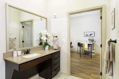 Private bathroom with modern fixtures and decor