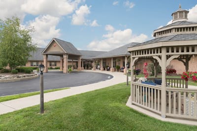 Exterior view of the assisted living facility and garden area