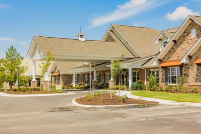 The entrance and exterior of a senior living facility