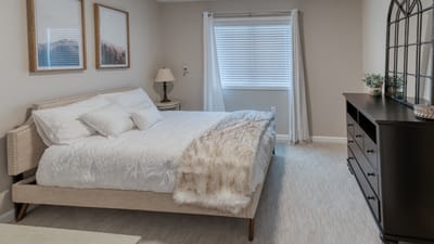 Cozy private room with bed and window