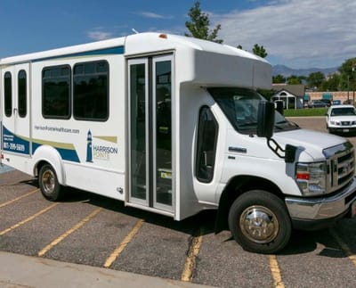 Facility transport vehicle parked in a lot