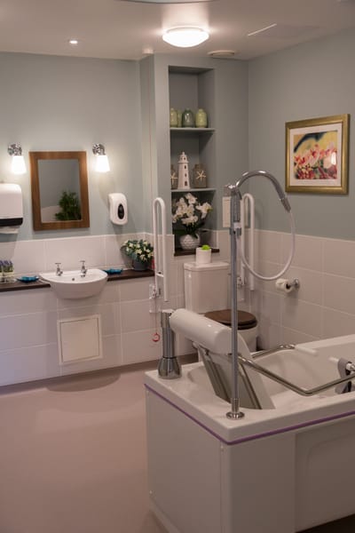 Well-equipped bathroom with accessibility features