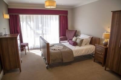 Cozy interior of a resident's room with natural light
