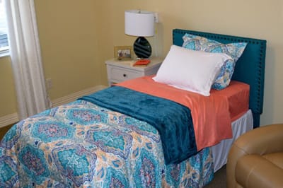 Cozy private room with bed and decor