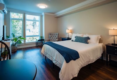 Cozy and well-lit private resident room with a view